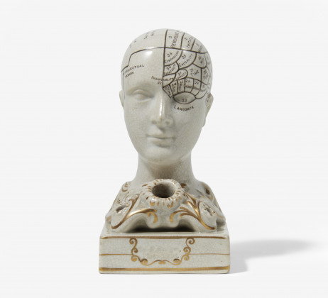 Phrenologic head as inkwell and quill holder