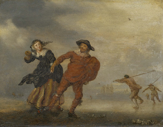 Holländisches Paar mit Schlittschuhen auf dem Eis