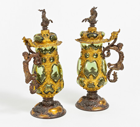 Pair of extraordinary and splendid historism goblets made of gilt bronze and green forest glass
