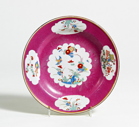 Porcelain plate with Kakiemon cartouches on purple background