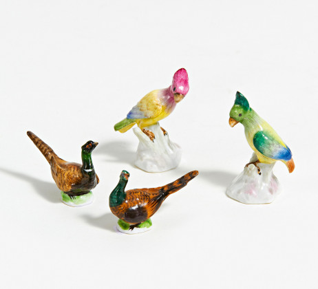 Vier Miniaturvögel