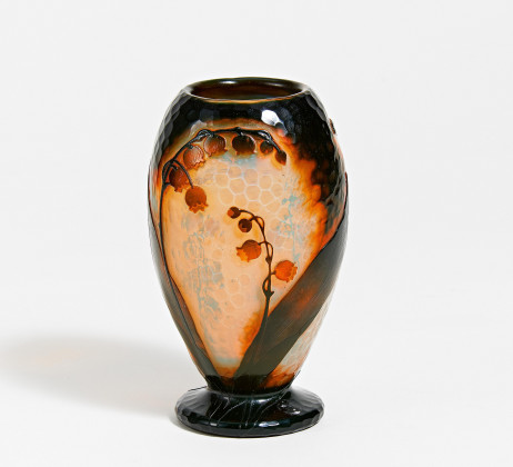 Small glass vase with lilies of the valley