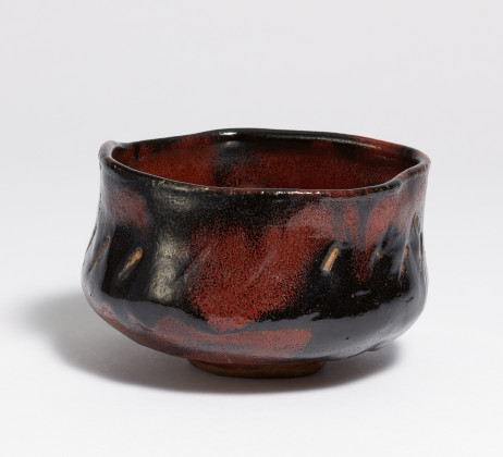 Large tea bowl (chawan) in red black Raku