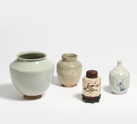 An elegant moon vase and three more jars