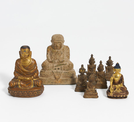 Acht kleine buddhitische Figuren