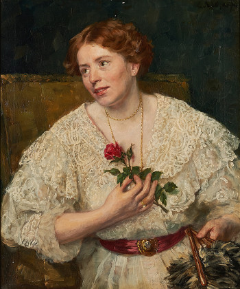 Portrait einer jungen Frau mit Rose