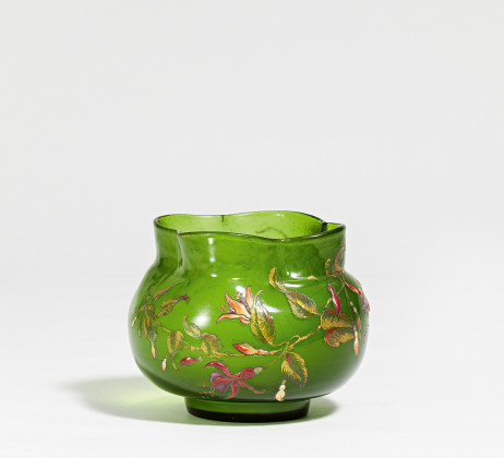 Round bulbous glass vase with fuchsias