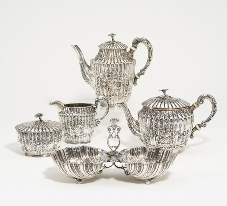 Four-piece silver coffee and tea service with floral décor