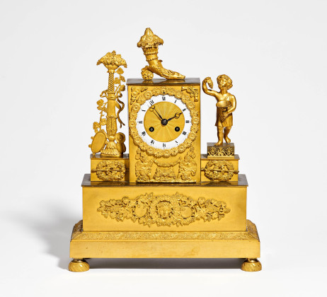 Pendulum clock with small Bacchantes