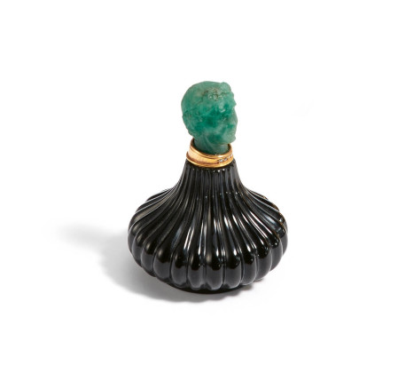 Small perfume flacon with antique-like woman's head