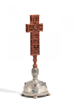 Finely carved crucifix on stand with scenes from the life of Christ