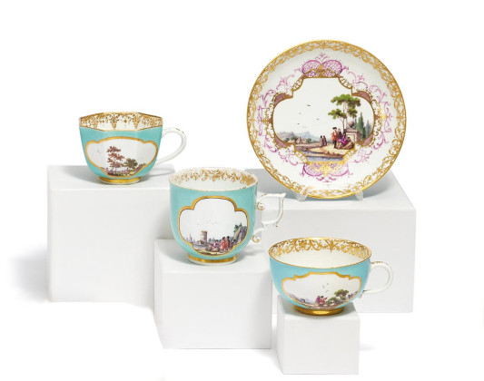 PORCELAIN CUP WITH SAUCER AND TWO PORCELAIN CUPS WITH TURQUOISE GROUND AND LANDSCAPE CARTOUCHES
