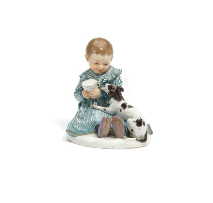 PORCELAIN FIGURINE OF A SMALL CHILD WITH CUP AND SMALL DOG