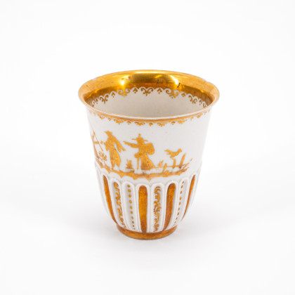 FLUTED PORCELAIN BEAKER WITH GOLDEN CHINOISERIES