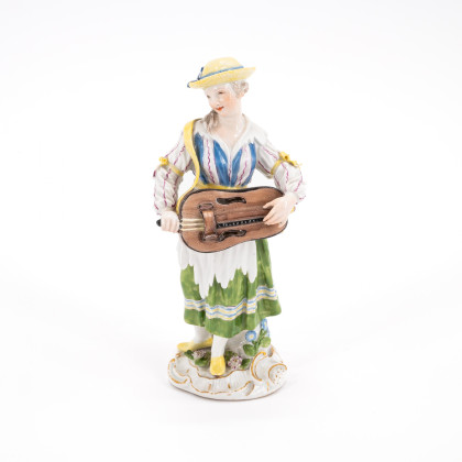 PORCELAIN FEMALE MUSICIAN WITH HURDY-GURDY