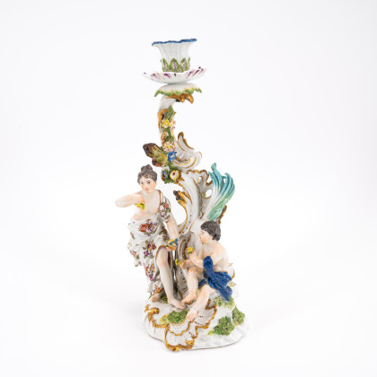 LARGE ROCAILLE CANDLESTICK WITH ALLEGORY OF APHRODITE AND PUTTO