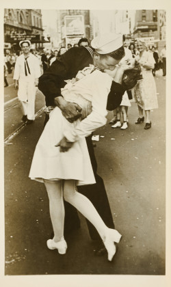 Sailor kissing a Nurse