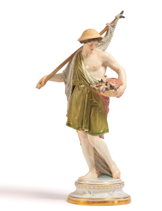 LARGE PORCELAIN FIGURINE OF A FISHER
