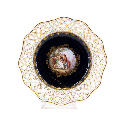 DECORATIVE PORCELAIN PLATE WITH COBALT BLUE GROUND, PIERCED RIM AND ROCOCO COUPLE