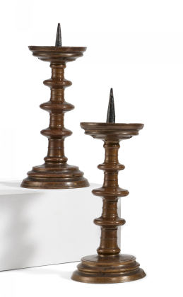 A PAIR OF LARGE METAL DISC CANDLESTICK