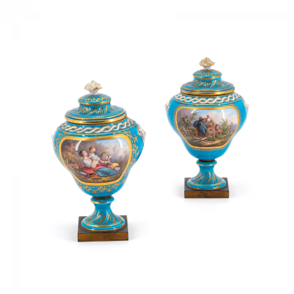 PORCELAIN PAIR OF SMALL FOOTED VASES WITH GENRE DEPICTIONS