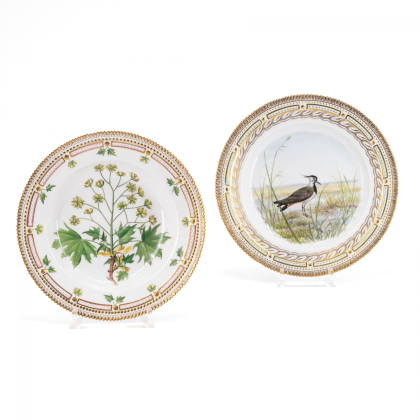 ONE PORCELAIN PLATE WITH CLASSIC 'FLORA DANICA' DECORATION & ONE PLATE WITH BIRD PAINTING AND 'FLORA DANICA' RIM