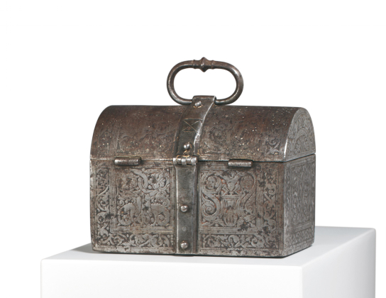 SMALL IRON CASKET WITH GROTESQUES
