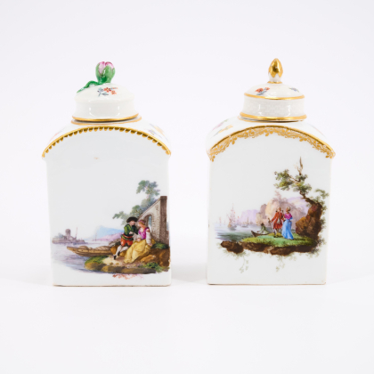 TWO PORCELAIN TEA CADDIES WITH ROUNDED SHOULDER, MERCHANT AND LANDSCAPE SCENES