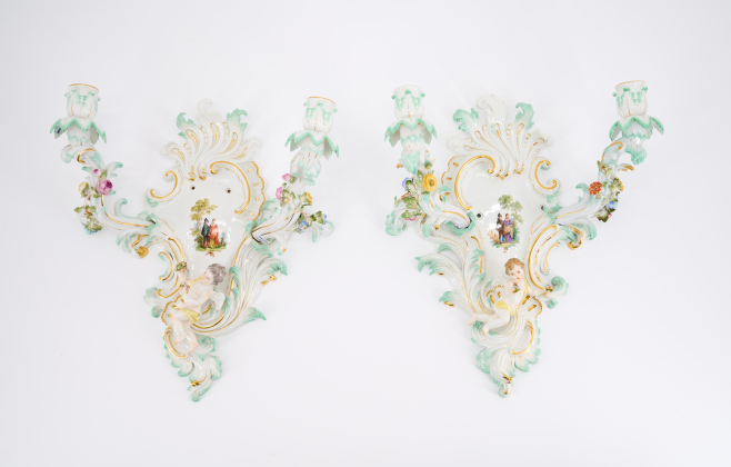 PAIR OF PORCELAIN APPLIQUES WITH CUPIDS