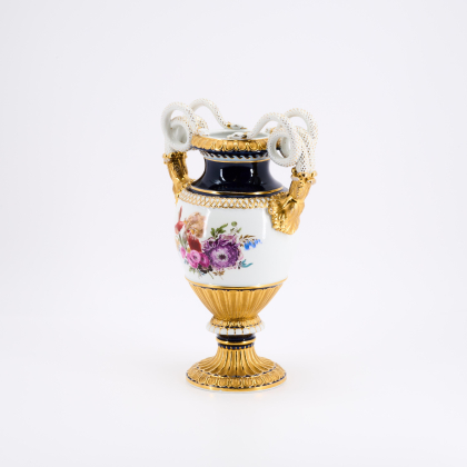 PORCELAIN SNAKE HANDLE VASE WITH FLORAL DECOR AND COBALT RIM