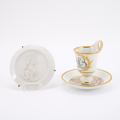 COMMEMORATIVE CUP OF THE BATTLE OF LEIPZIG WITH MATCHING SAUCER
